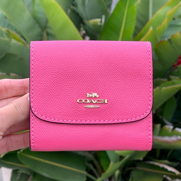 Coach Handbags - COACH Pink Ruby Leather Trifold Zip Wallet